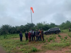 setup of a windsock at the permanent site of Mudiame University 